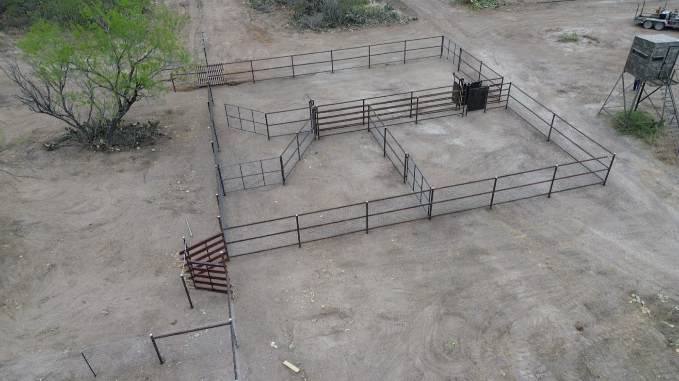Aerial view of finished pipe working pens with alleys and gates